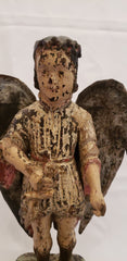 Wood carved angel with tin wings