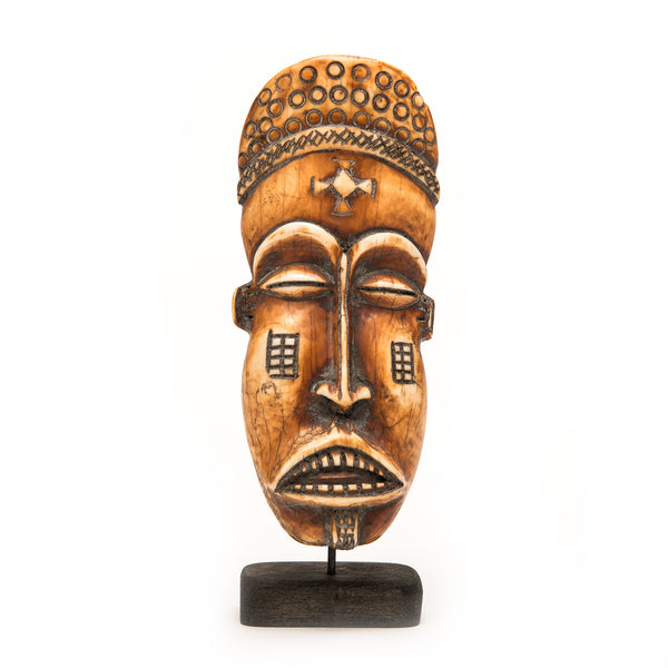 Carved Face on Stand