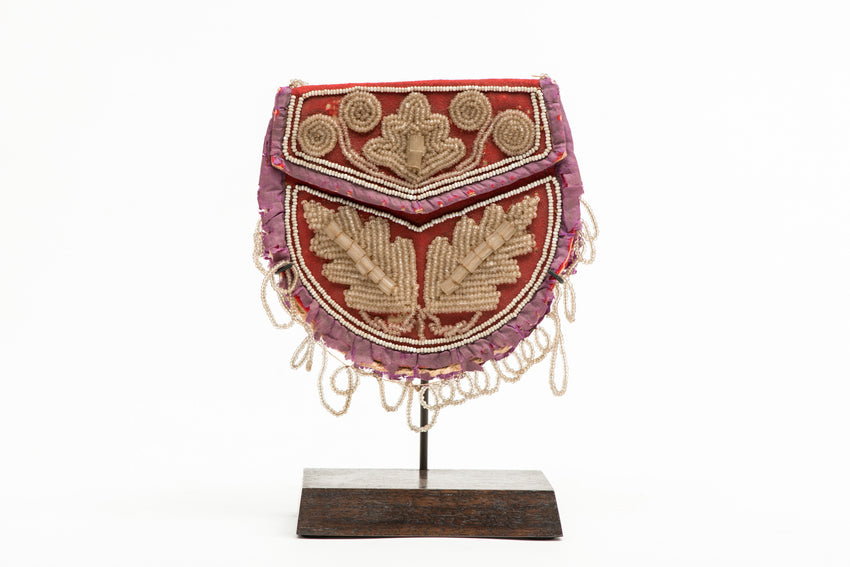 Iroquois wool beaded Bag on wooden stand,