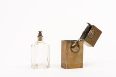 Perfume bottle in a Bronze Container