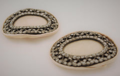 pair of shoe buckles