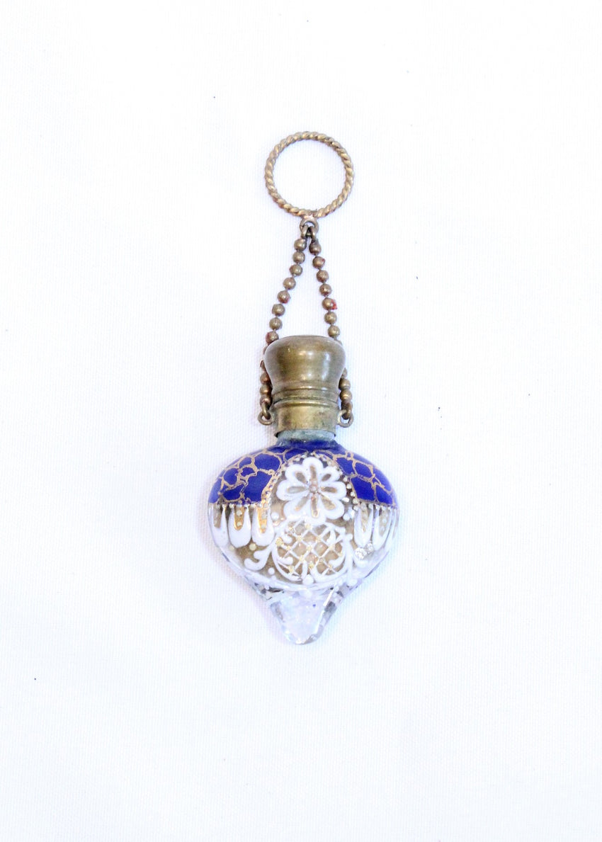 Miniature heart shaped perfume bottle