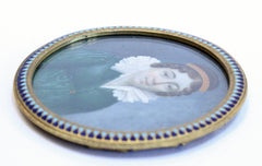 Miniature Portrait of a Lady in a Green Dress and a Red Hairband, French School circa 1810