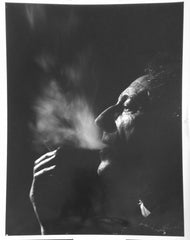 Cocteau, Jean; Smoking Profile Photo by Philippe Halsman, 1949