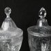 Two Covered Glass Urns